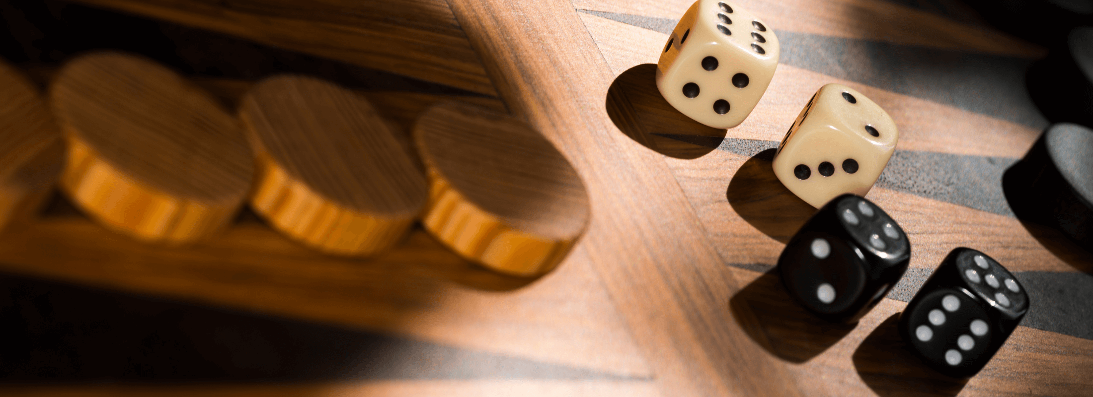 Close up of backgammon board with 4 dice